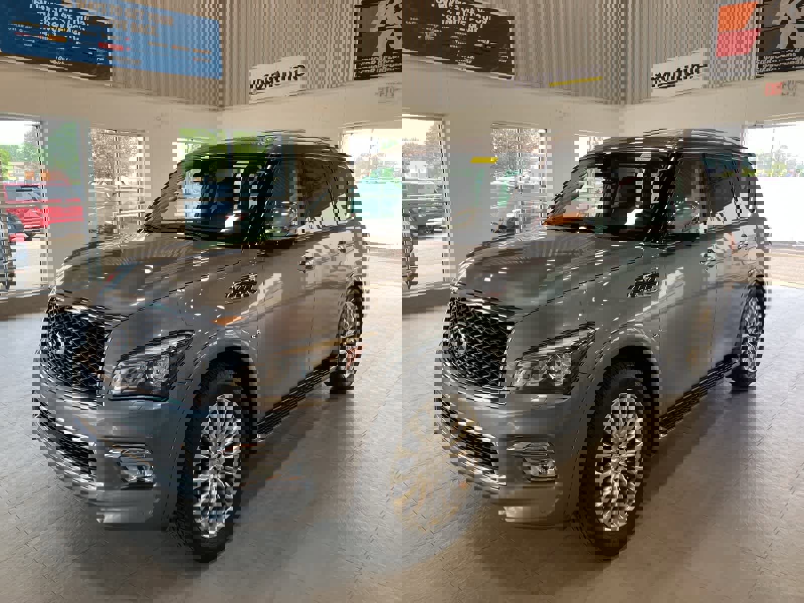 Used 2015 INFINITI QX80 4WD w/ Deluxe Technology Package