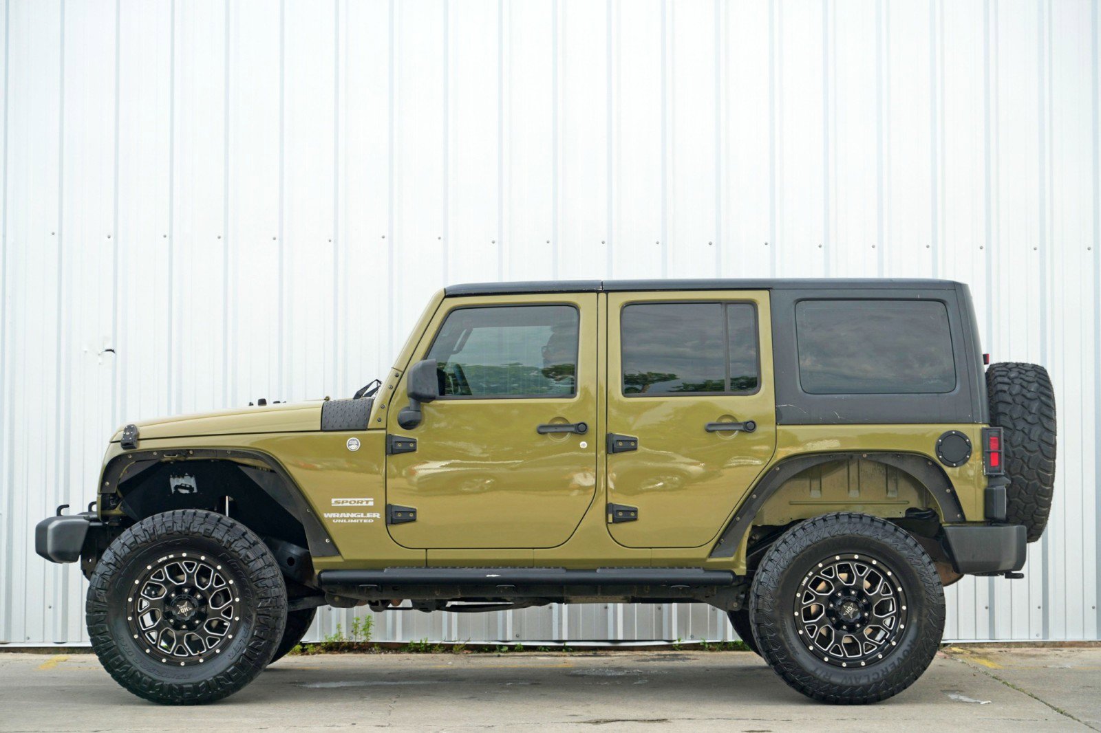 Used 2013 Jeep Wrangler Unlimited Sport w/ Mopar Black Appearance Group image 8