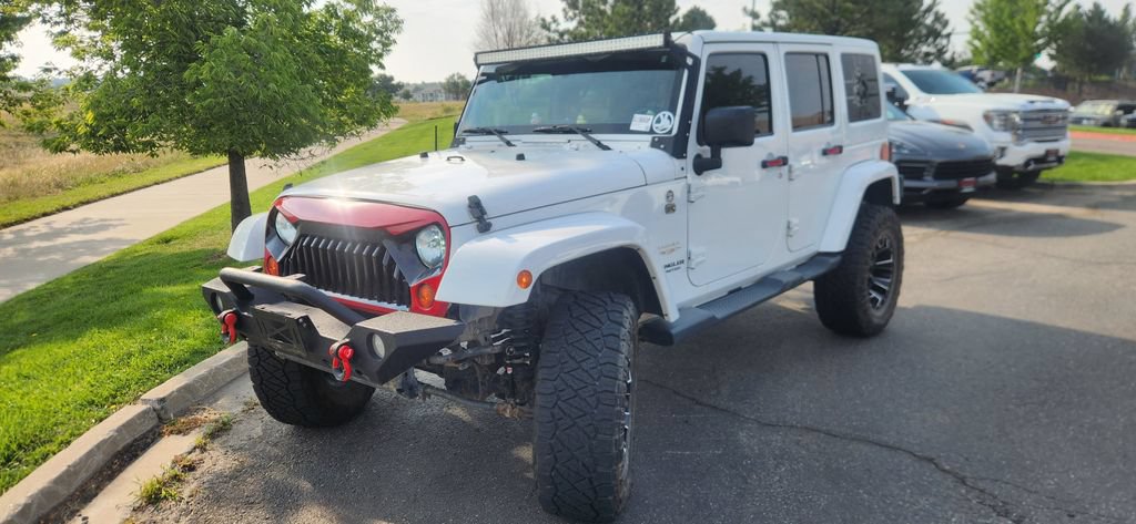 Used 2012 Jeep Wrangler Unlimited Sahara w/ Connectivity Group AWD/4WD image 2