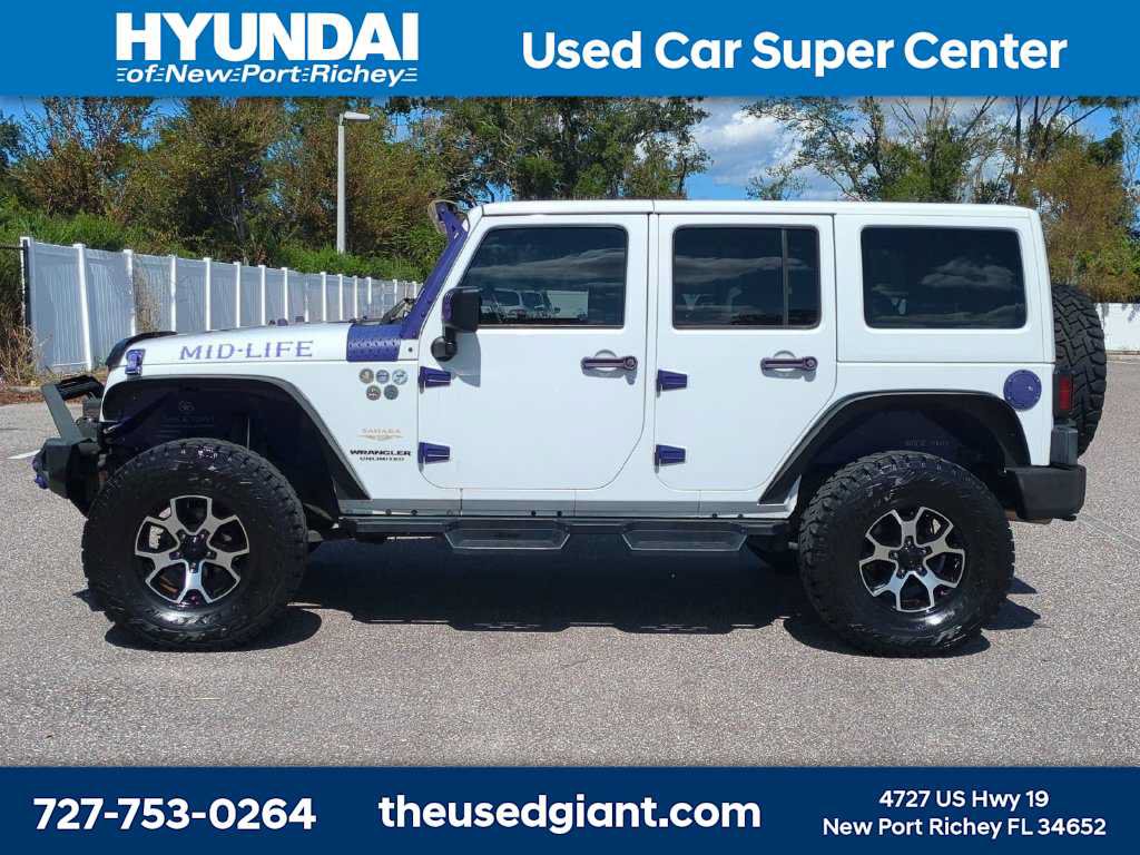 Used 2014 Jeep Wrangler Unlimited Sahara w/ Dual Top Group AWD/4WD image 2