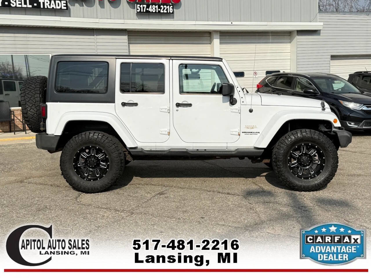 Used 2014 Jeep Wrangler Unlimited Sahara w/ Dual Top Group image 9