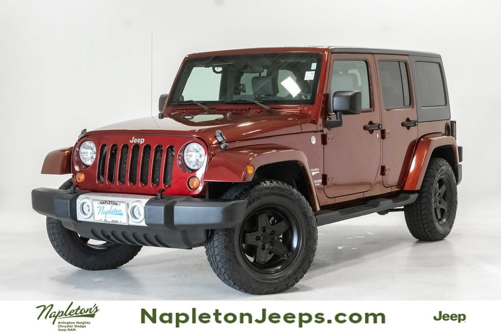 Used 2010 Jeep Wrangler Unlimited Sahara w/ Trailer Tow Group AWD/4WD image 1
