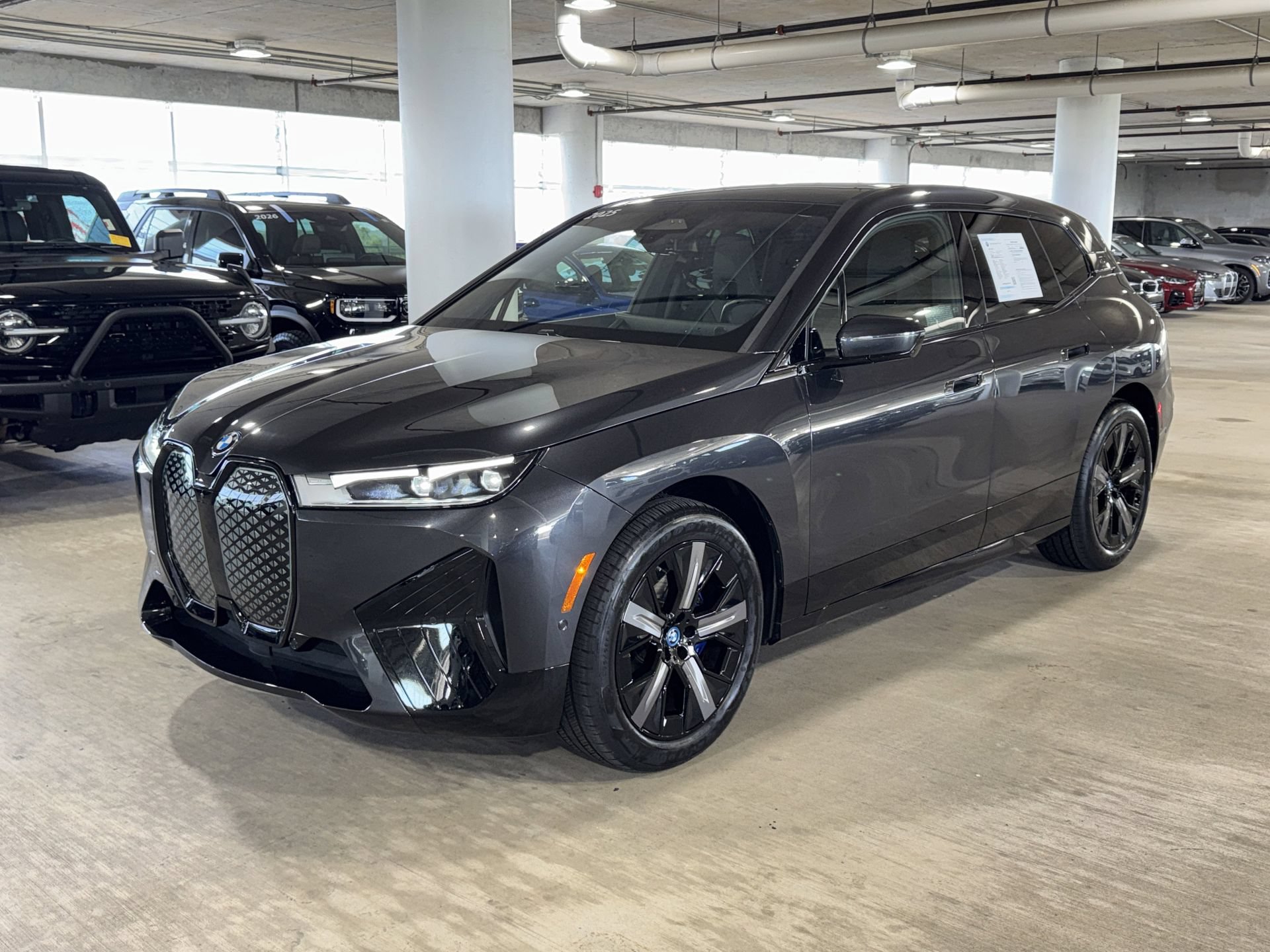 Used 2025 BMW iX xDrive50 w/ Sport Package AWD/4WD image 3