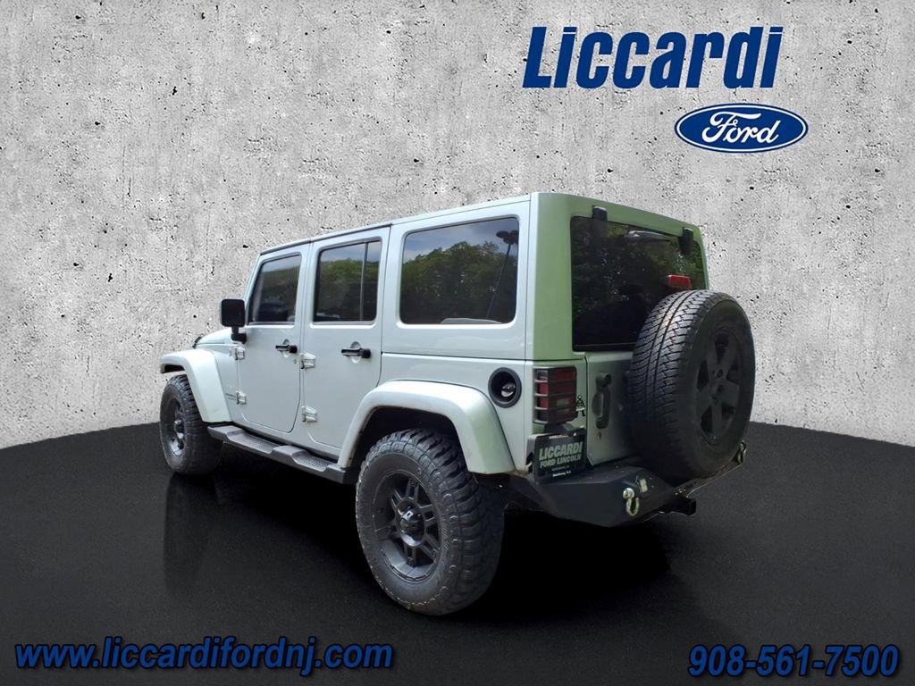 Used 2012 Jeep Wrangler Unlimited Sahara w/ Dual Top Group AWD/4WD image 4