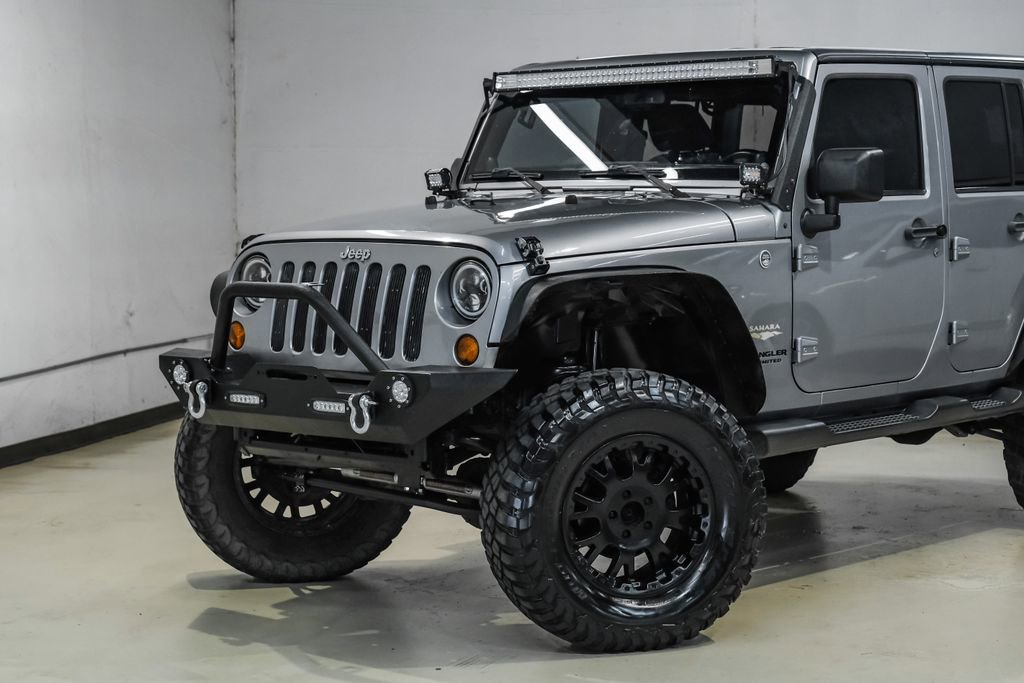 Used 2013 Jeep Wrangler Unlimited Sahara AWD/4WD image 5