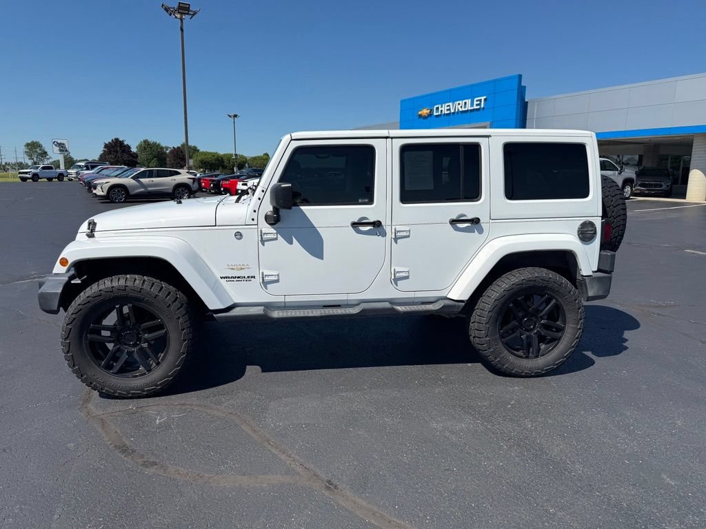 Used 2012 Jeep Wrangler Unlimited Sahara w/ Connectivity Group AWD/4WD image 2