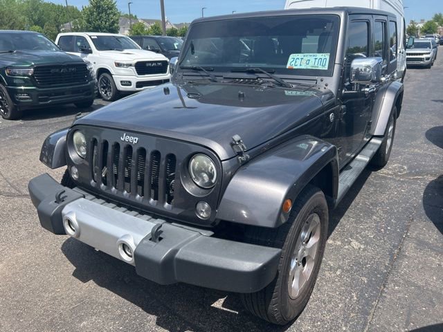 Used 2014 Jeep Wrangler Unlimited Sahara w/ Dual Top Group AWD/4WD image 1