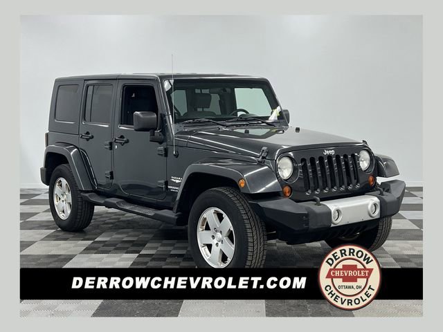 Used 2010 Jeep Wrangler Unlimited Sahara w/ Dual Top Group image 1