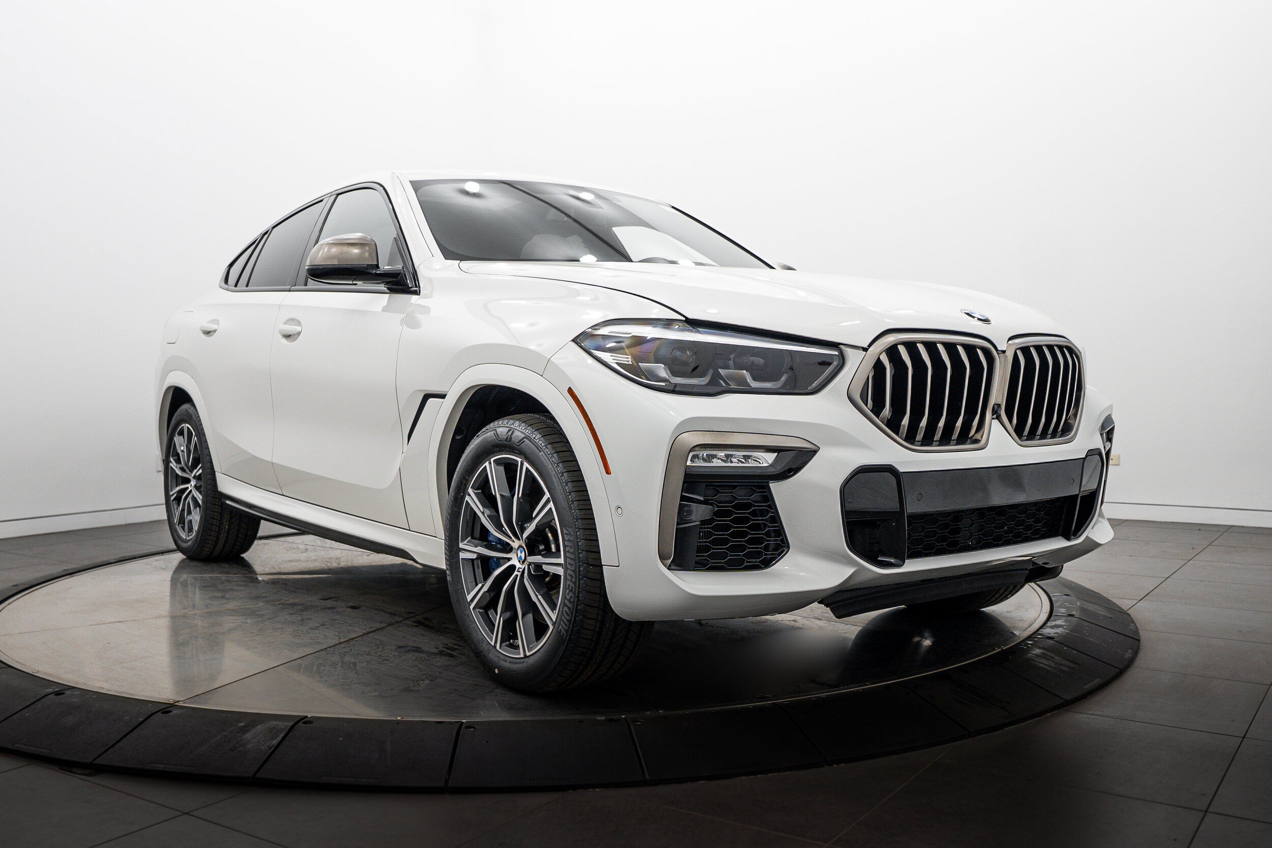 Used 2020 BMW X6 M50i w/ Luxury Seating Package AWD/4WD image 1
