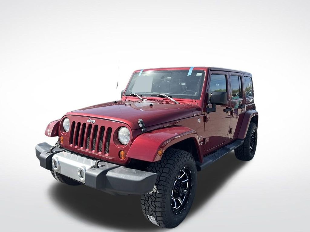 Used 2011 Jeep Wrangler Unlimited Sahara w/ Dual Top Group image 1
