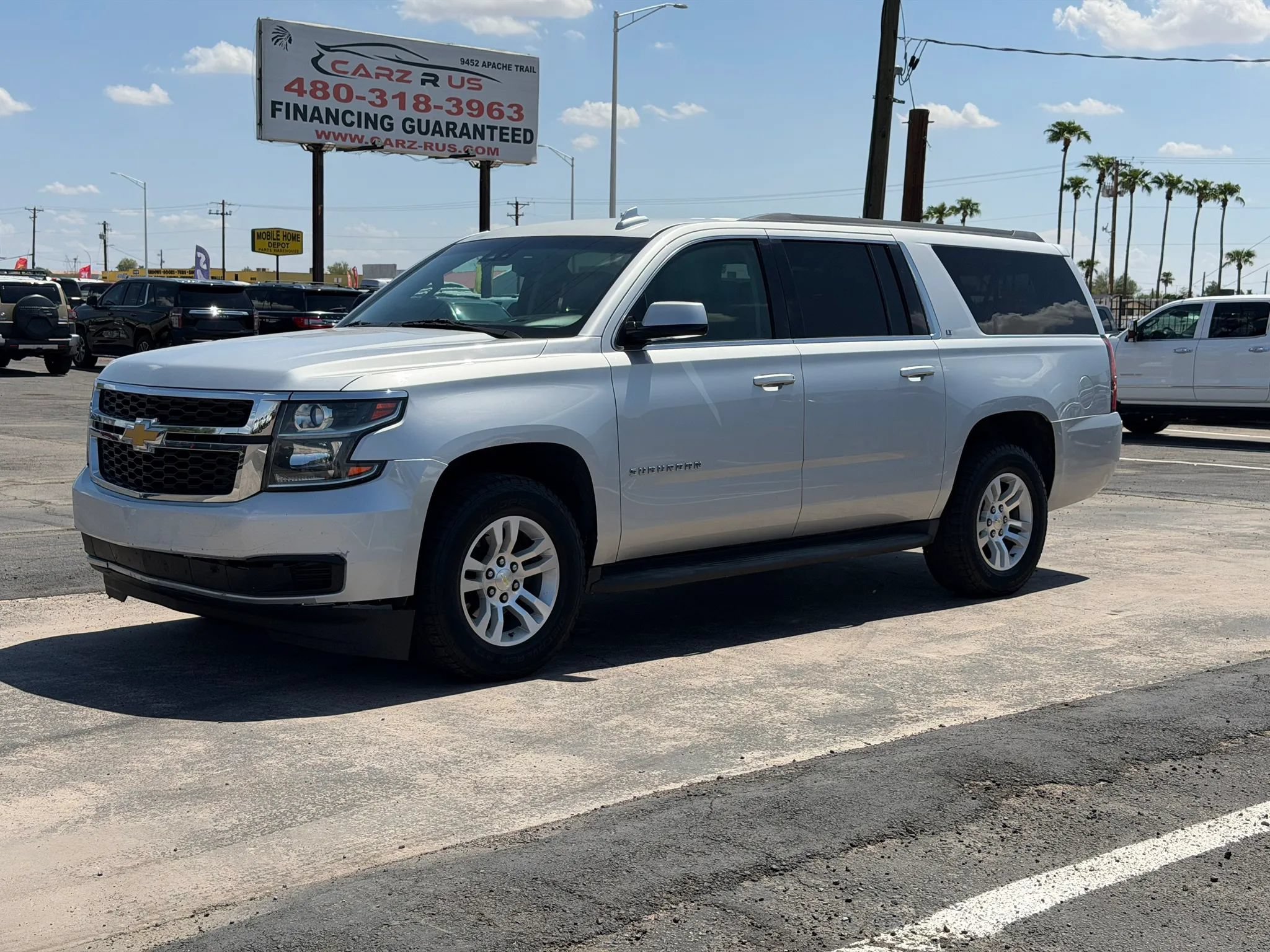 Used 2015 Chevrolet Suburban LT w/ Max Trailering Package AWD/4WD image 1