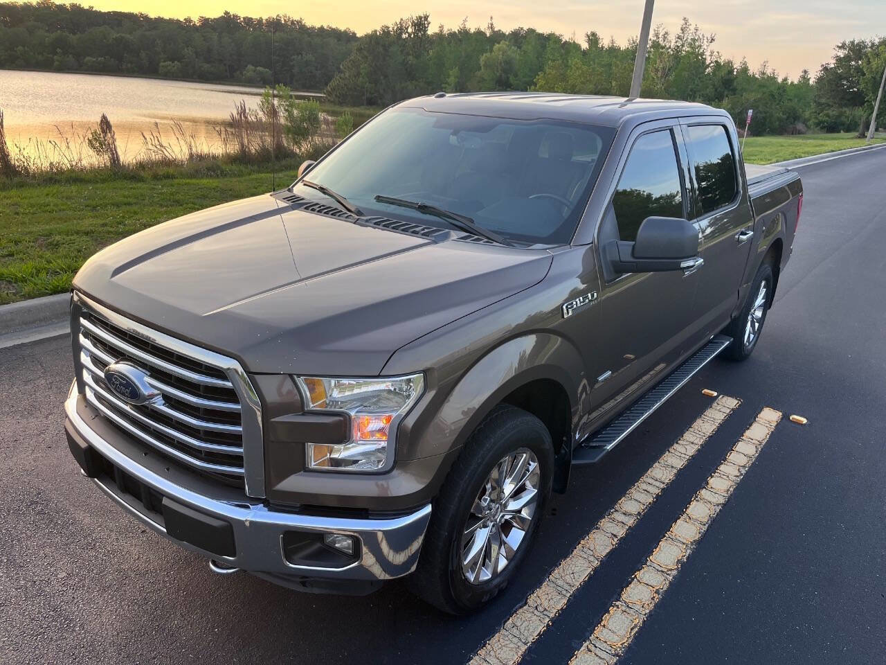 Used 2015 Ford F150 XLT w/ Equipment Group 302A Luxury AWD/4WD image 1