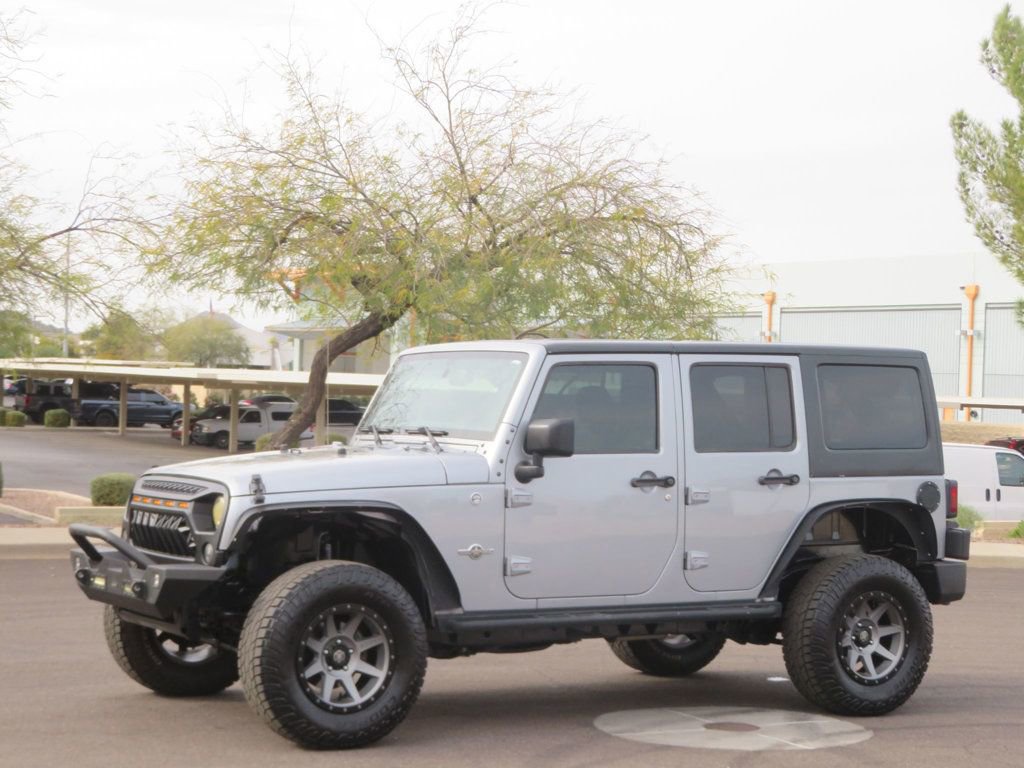 Used 2015 Jeep Wrangler Unlimited Sport AWD/4WD video 1