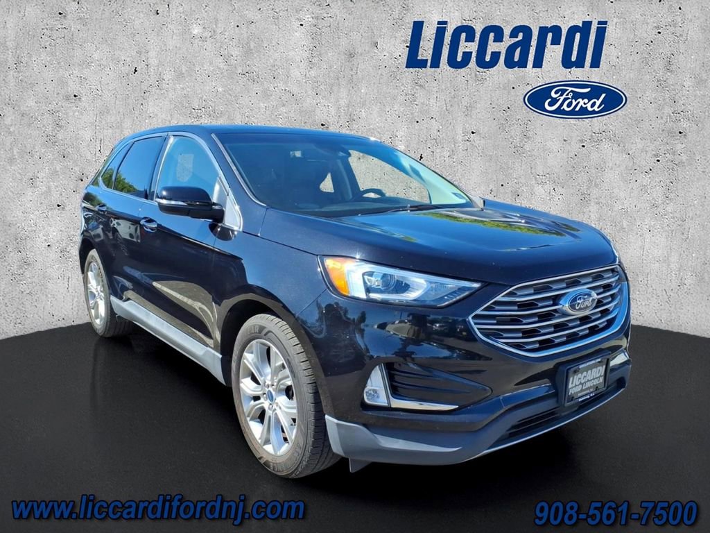 Certified 2019 Ford Edge Titanium w/ Cold Weather Package AWD/4WD image 1