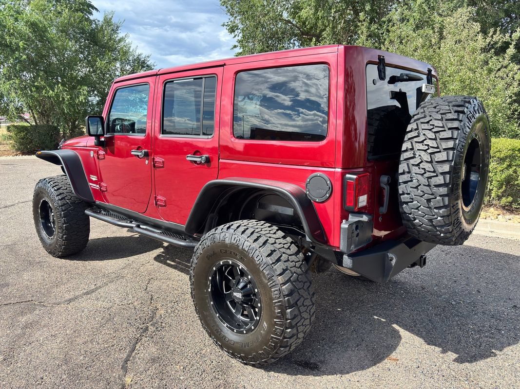 Used 2013 Jeep Wrangler Unlimited Sahara w/ Dual Top Group AWD/4WD image 7