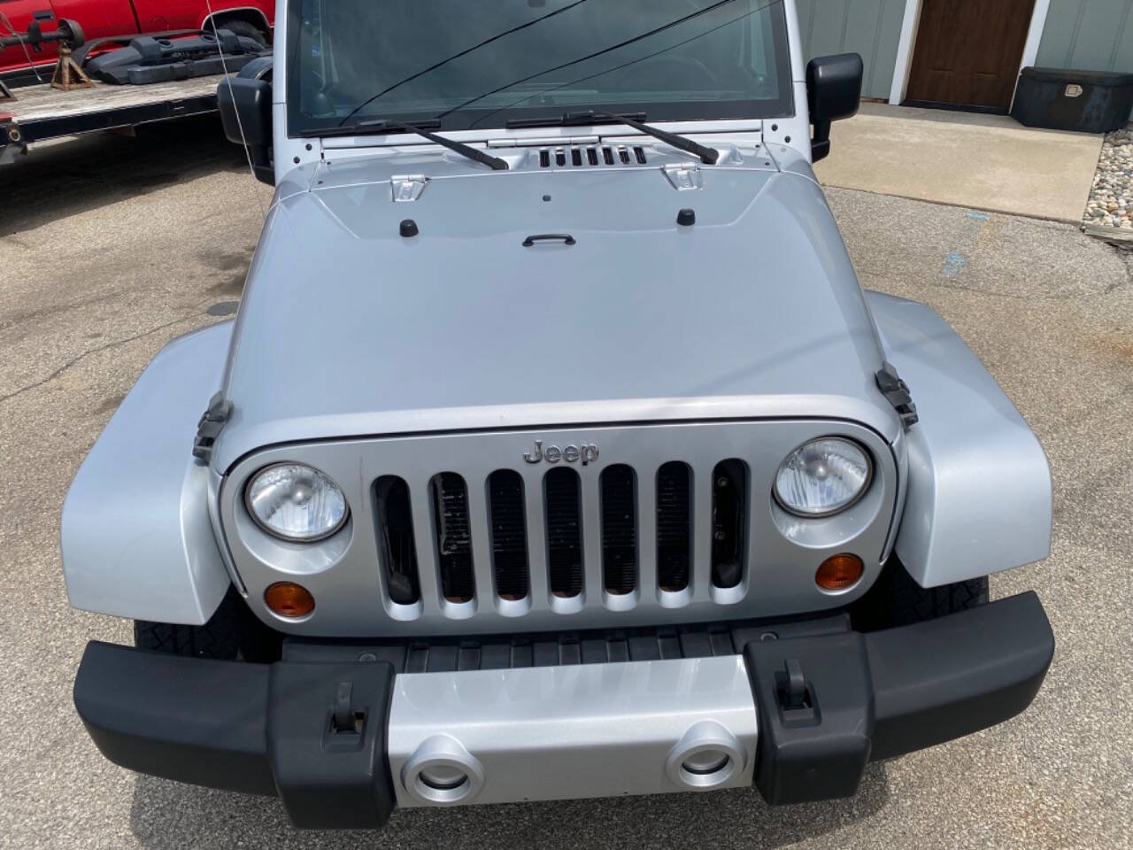 Used 2012 Jeep Wrangler Unlimited Sahara w/ Dual Top Group AWD/4WD image 7