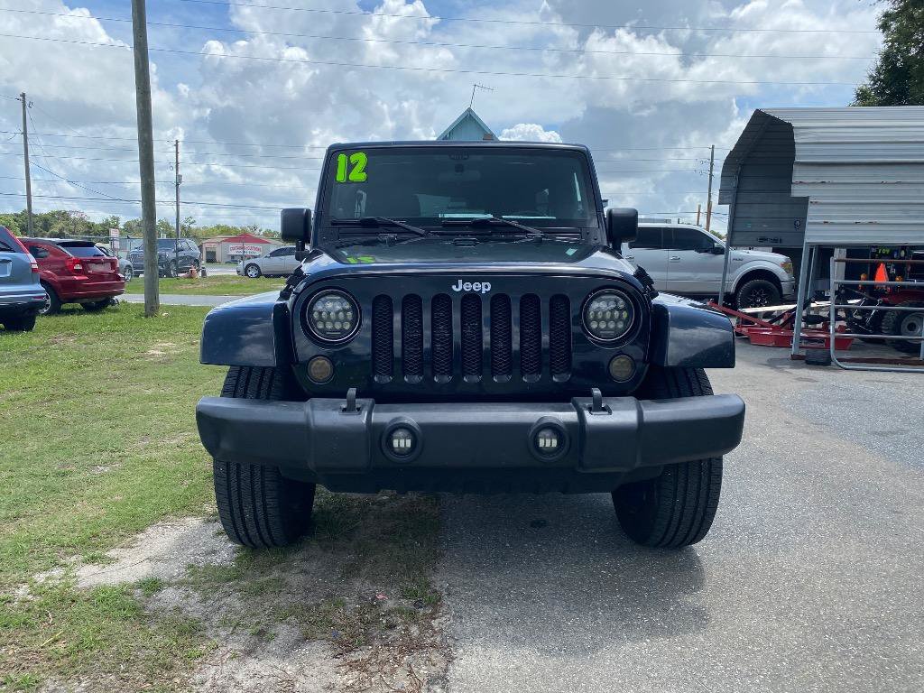 Used 2012 Jeep Wrangler Unlimited Sahara w/ Dual Top Group AWD/4WD image 4