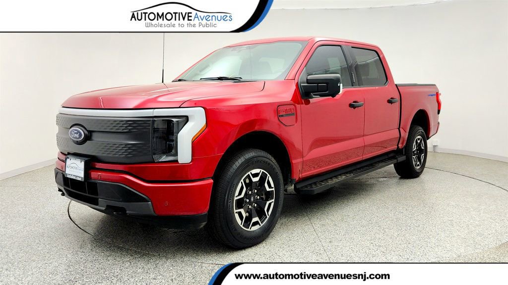 Used 2023 Ford F150 Lightning XLT AWD/4WD image 1