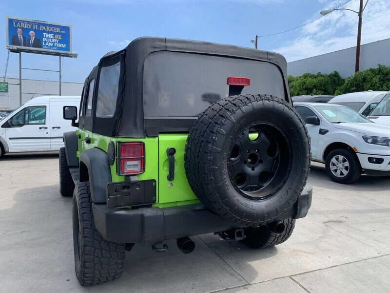 Used 2013 Jeep Wrangler Unlimited Sport w/ Mopar Black Appearance Group image 5