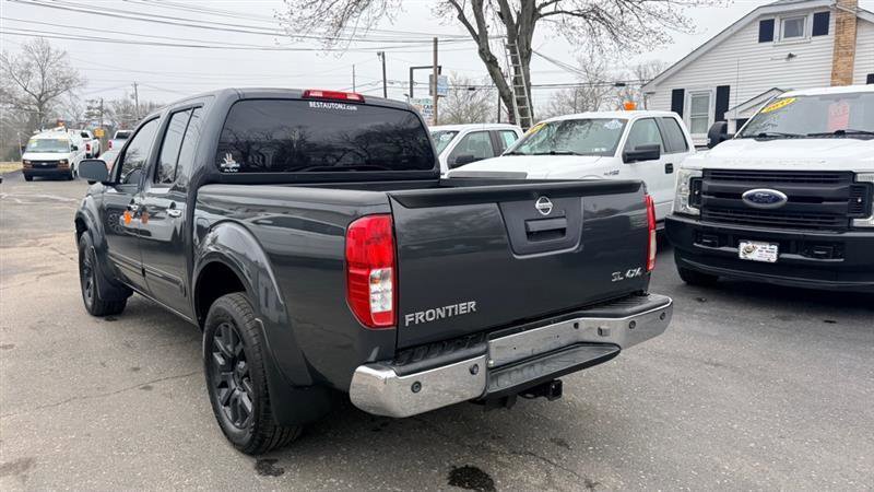 Used 2013 Nissan Frontier SL image 2