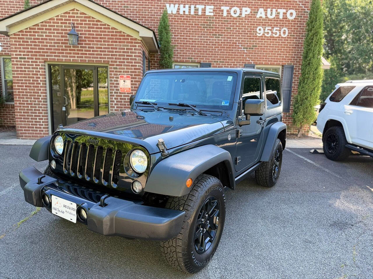 Used 2016 Jeep Wrangler Sport AWD/4WD image 1