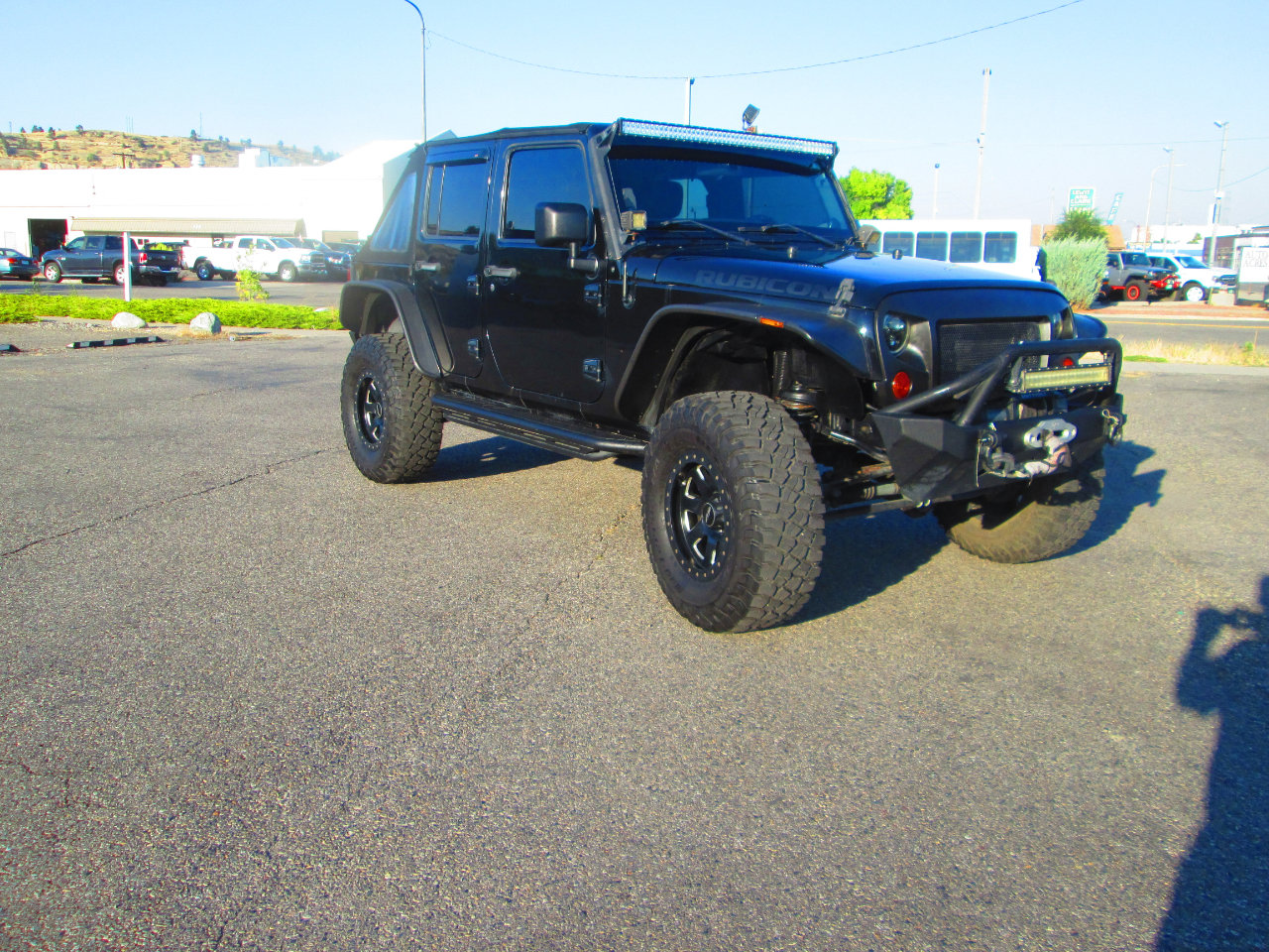 Used 2012 Jeep Wrangler Unlimited Rubicon w/ Dual Top Group image 1