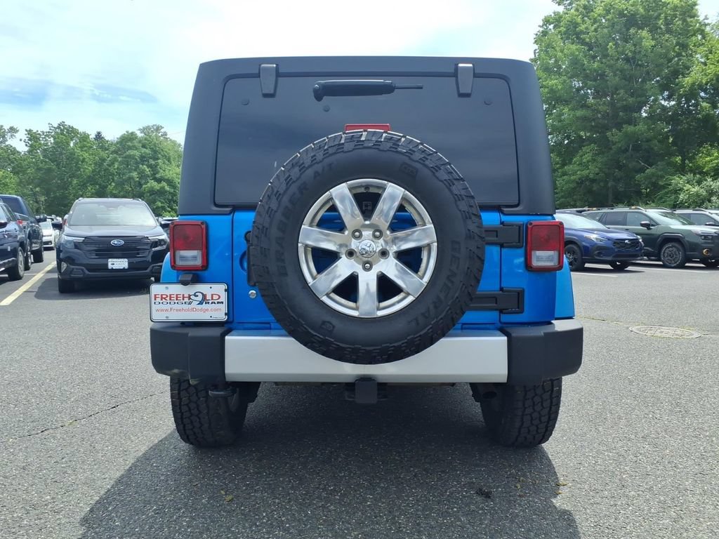 Used 2015 Jeep Wrangler Unlimited Sahara w/ Dual Top Group AWD/4WD image 16