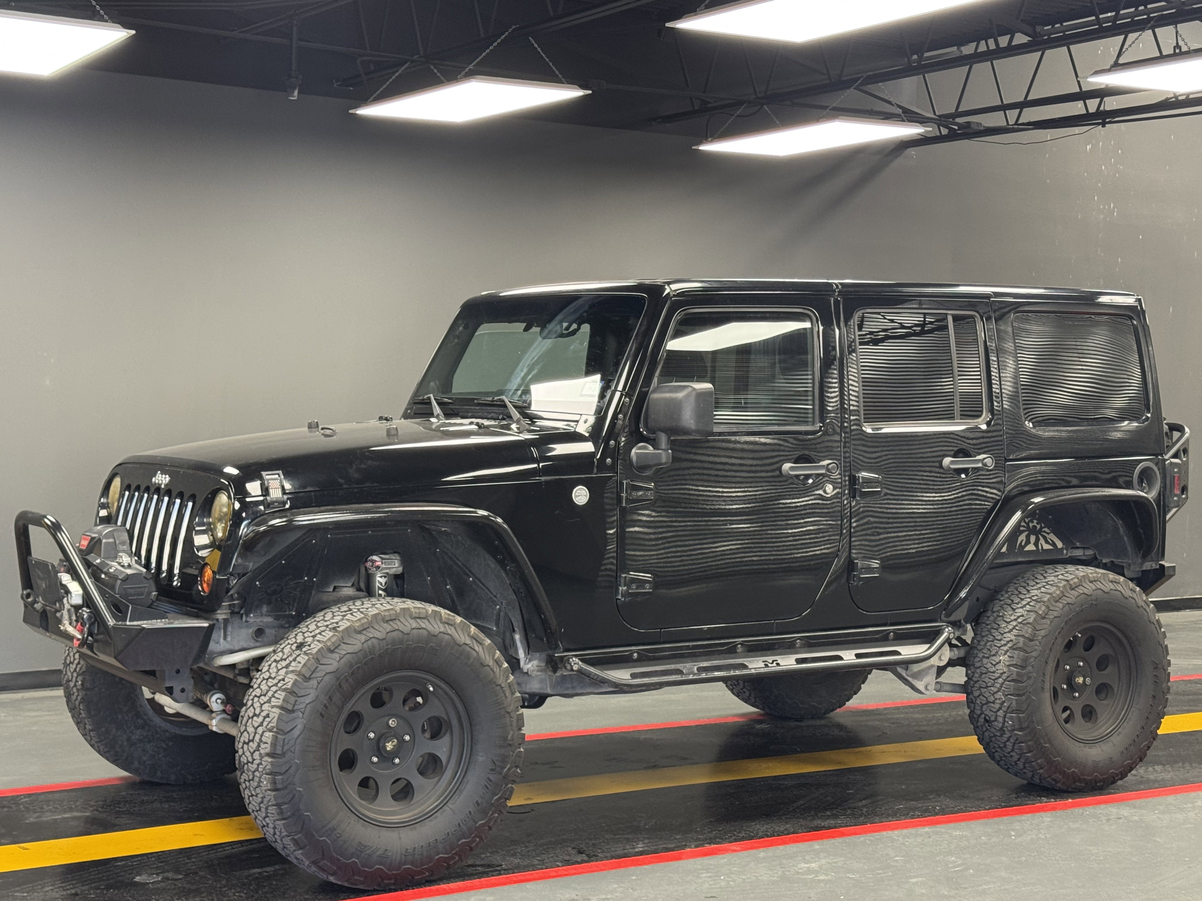 Used 2011 Jeep Wrangler Unlimited Sahara image 1