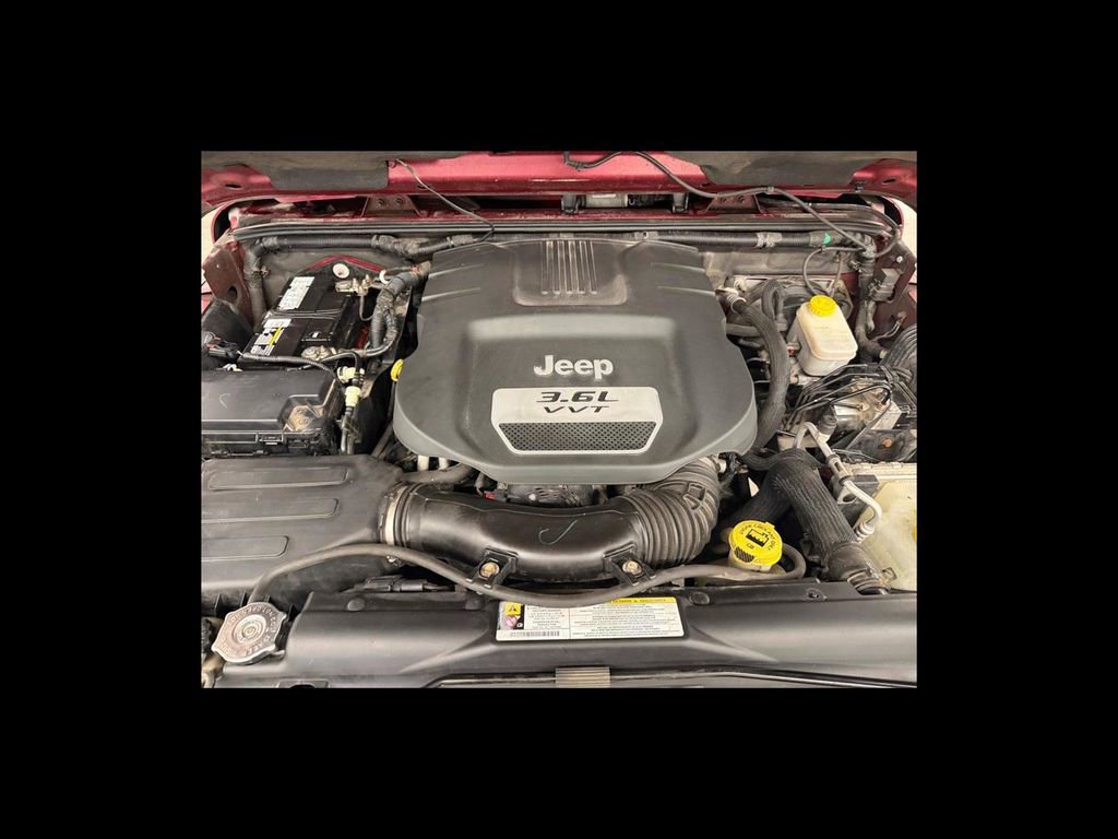 Used 2012 Jeep Wrangler Unlimited Sahara w/ Dual Top Group image 21