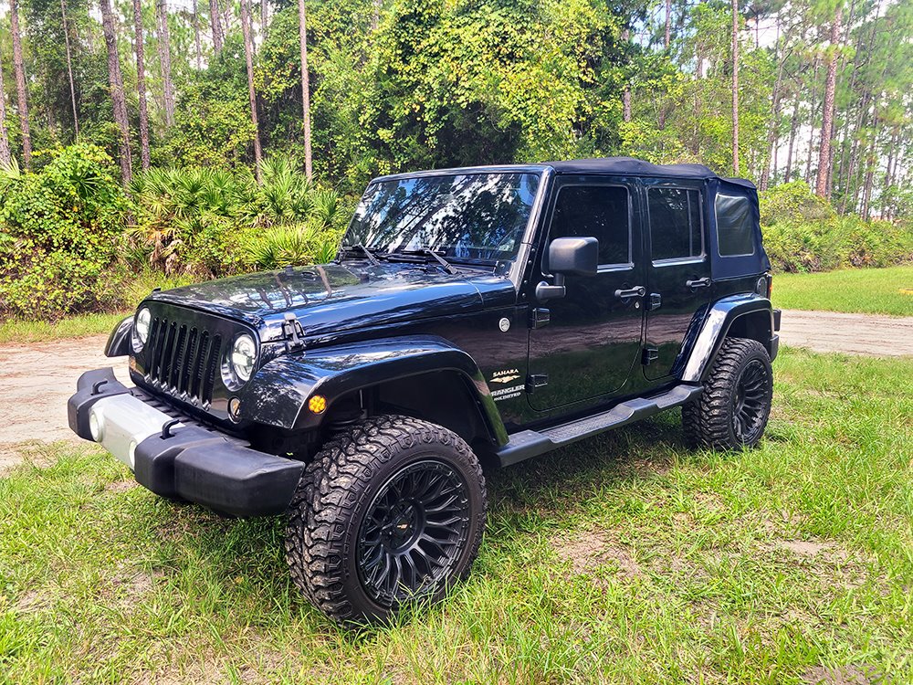 Used 2013 Jeep Wrangler Unlimited Sahara w/ Dual Top Group AWD/4WD image 1
