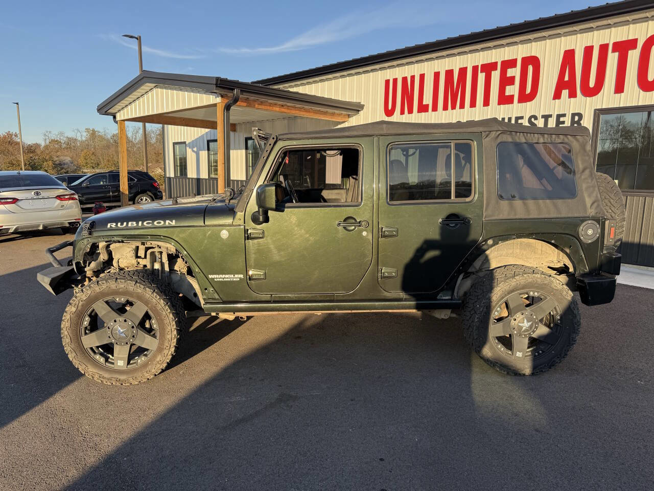 Used 2011 Jeep Wrangler Unlimited Rubicon w/ Dual Top Group image 12