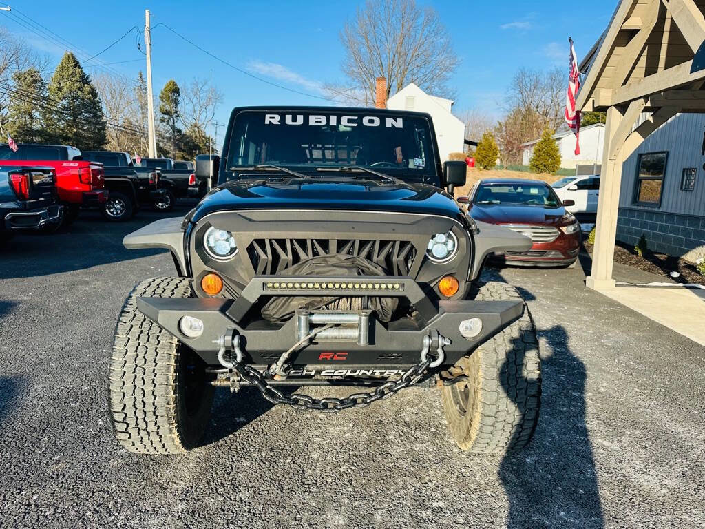 Used 2012 Jeep Wrangler Unlimited Rubicon w/ Dual Top Group image 2