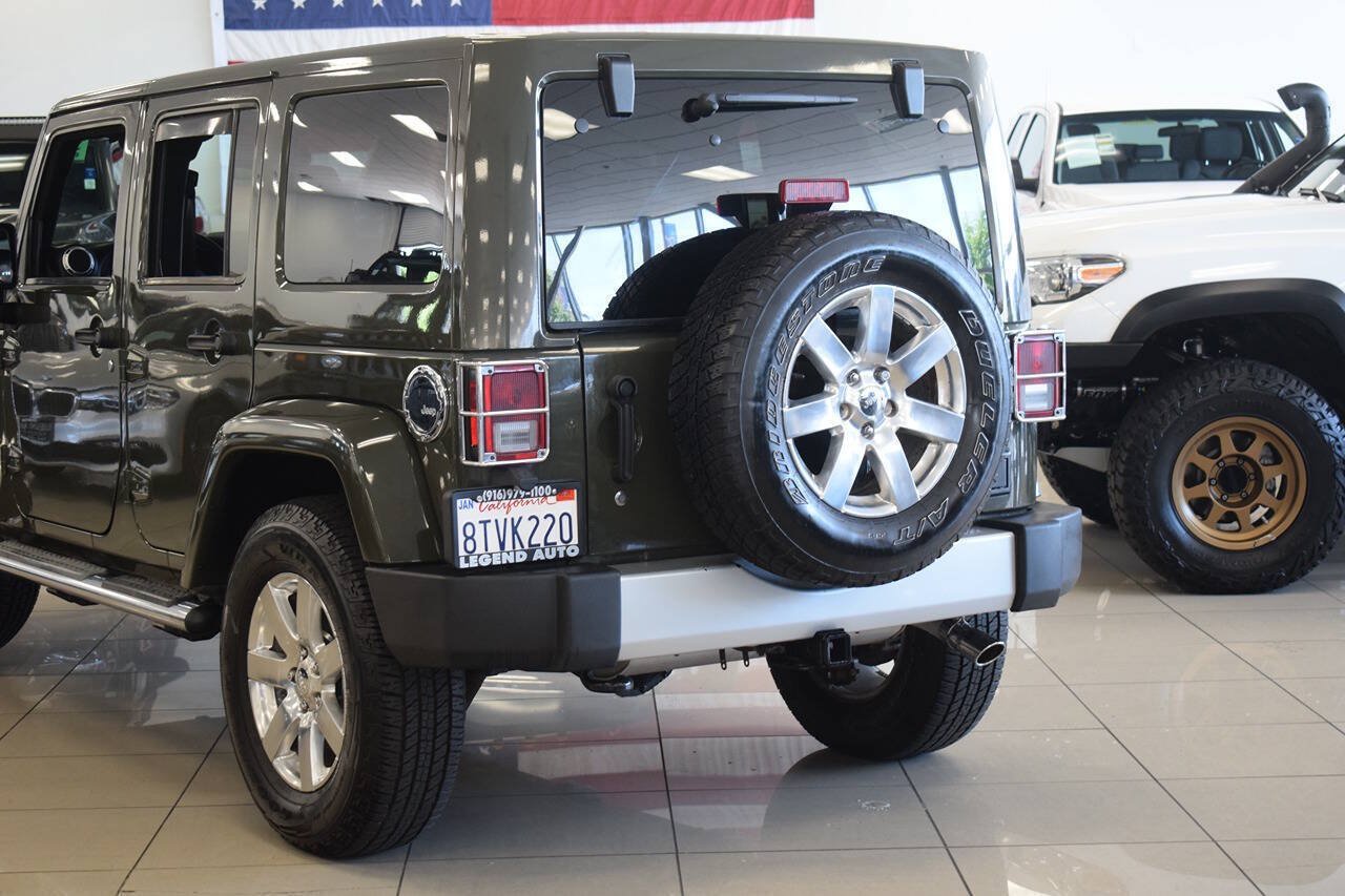 Used 2015 Jeep Wrangler Unlimited Sahara w/ Dual Top Group AWD/4WD image 24