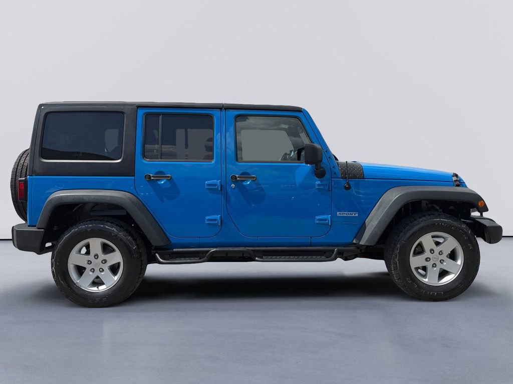 Used 2012 Jeep Wrangler Unlimited Sport AWD/4WD video 2
