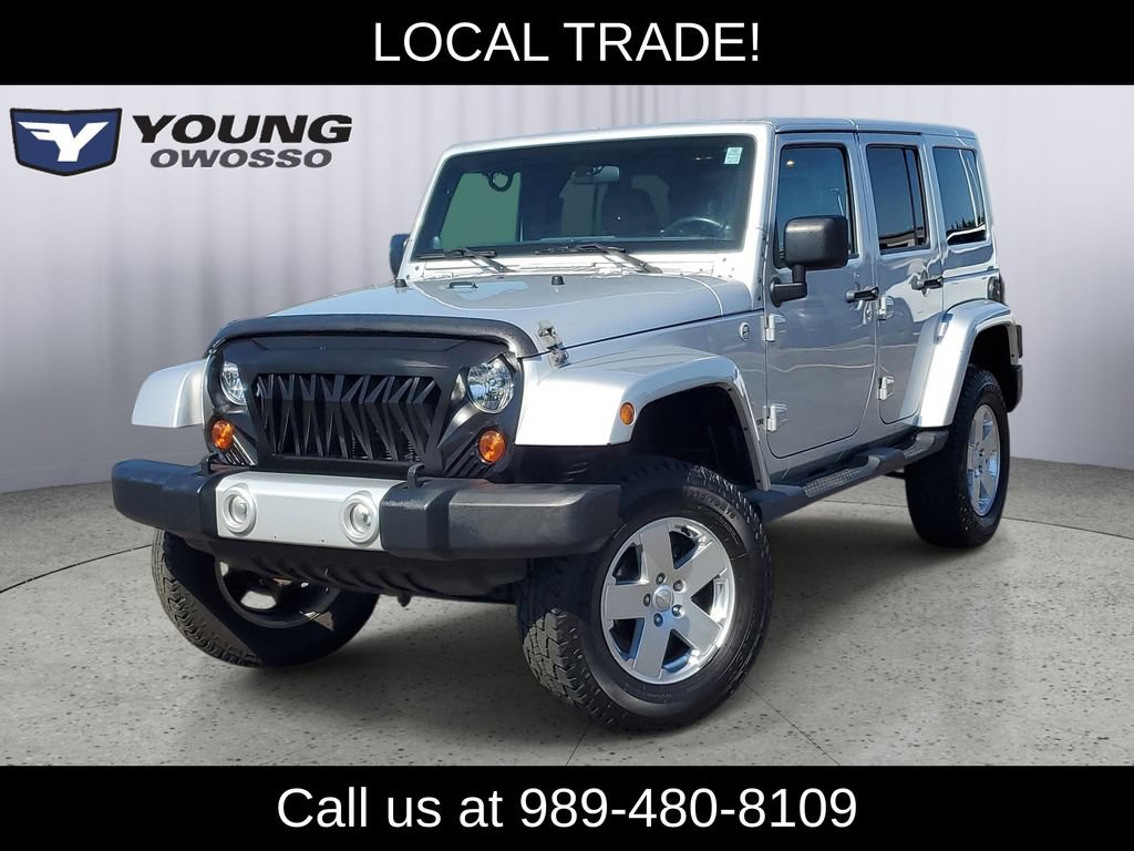 Used 2011 Jeep Wrangler Unlimited Sahara w/ Dual Top Group AWD/4WD image 1