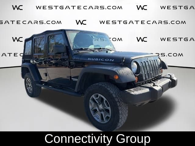 Used 2013 Jeep Wrangler Unlimited Rubicon w/ Connectivity Group AWD/4WD video 4