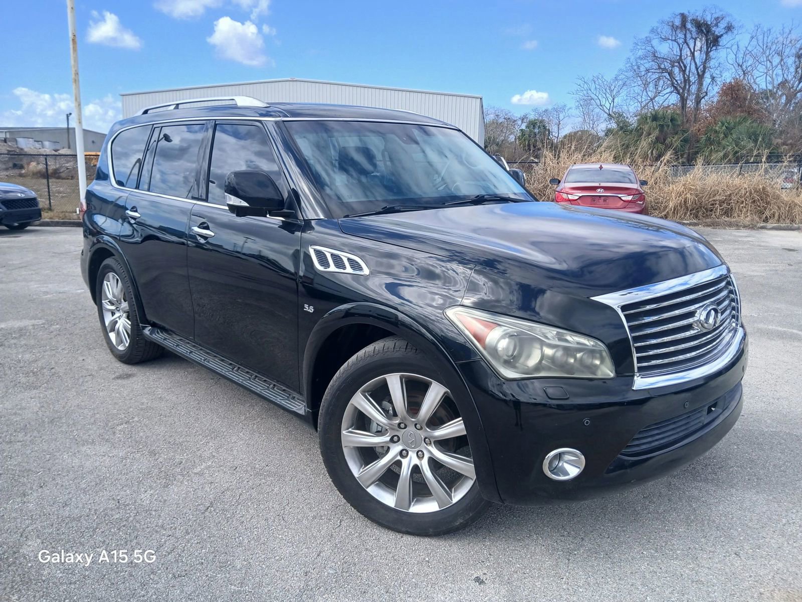 Used 2014 INFINITI QX80 4WD w/ Deluxe Touring Package