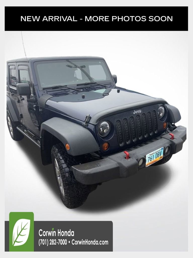 Used 2013 Jeep Wrangler Unlimited Sport
