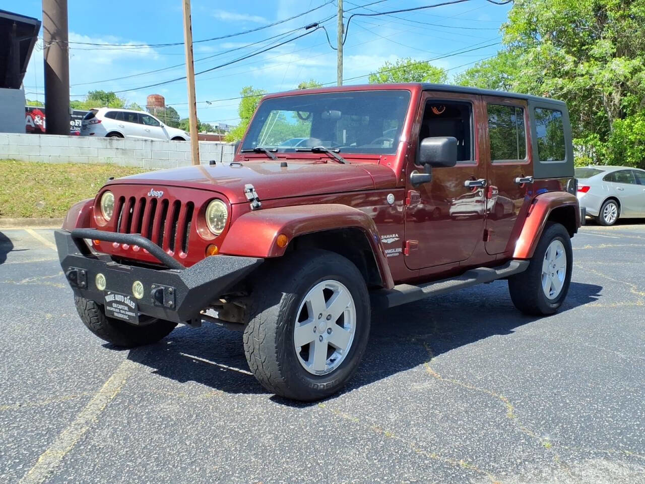 Used 2010 Jeep Wrangler Unlimited Sahara w/ Dual Top Group AWD/4WD image 8