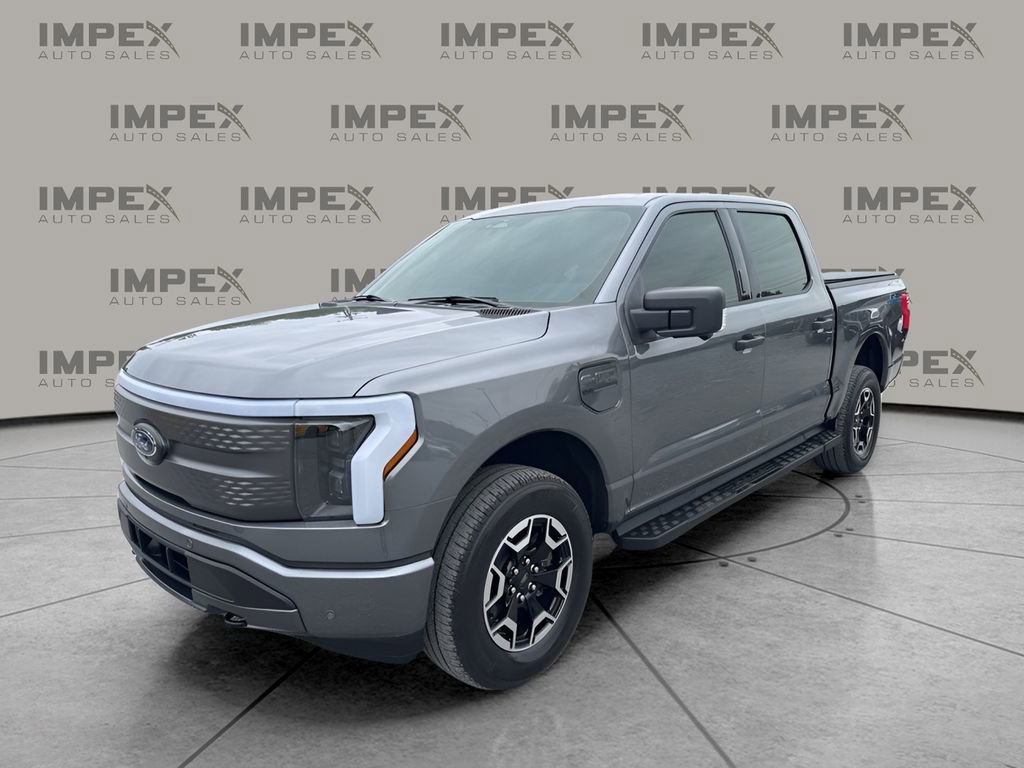 Used 2023 Ford F150 Lightning XLT AWD/4WD image 1