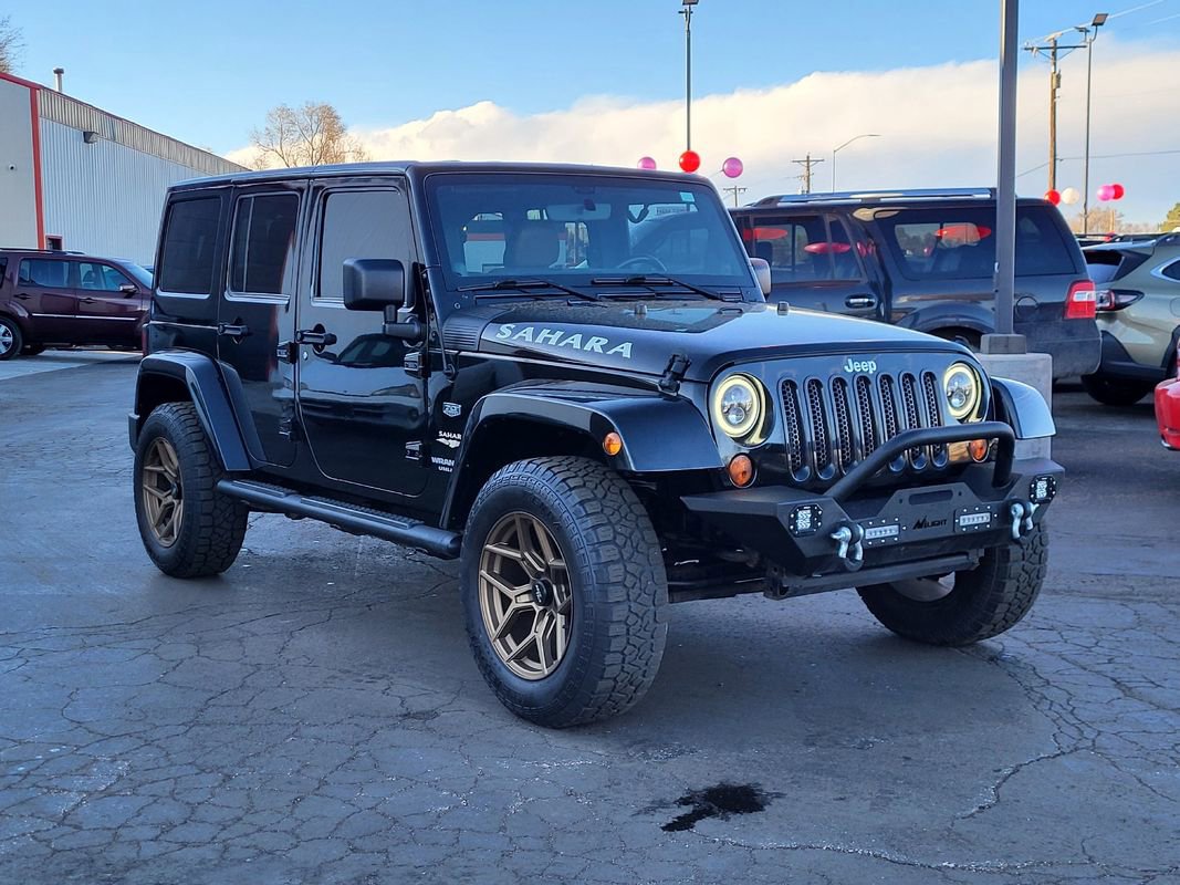 Used 2012 Jeep Wrangler Unlimited Sahara w/ Dual Top Group image 11