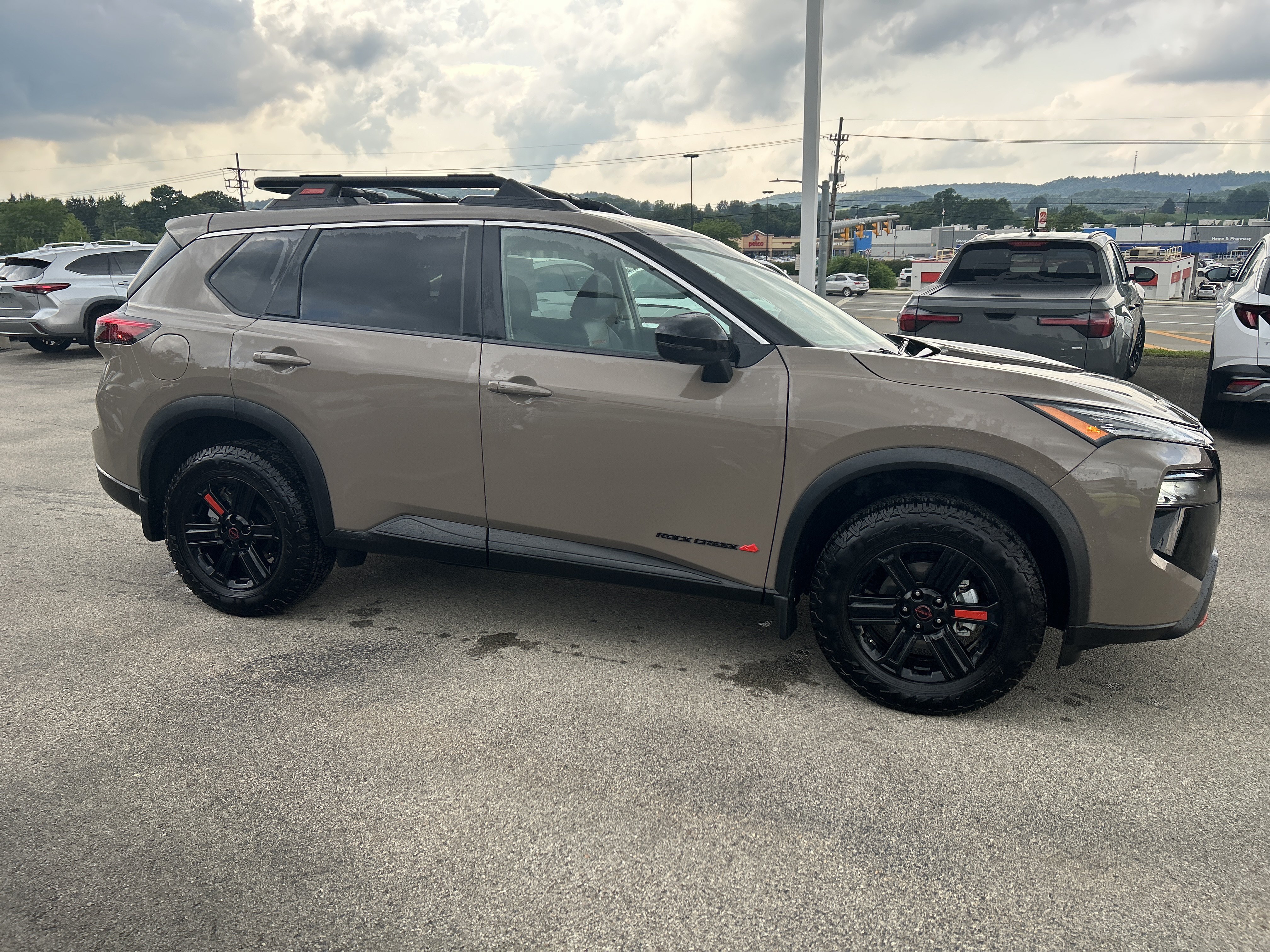 Used 2025 Nissan Rogue SV w/ Rock Creek Premium Package AWD/4WD image 2