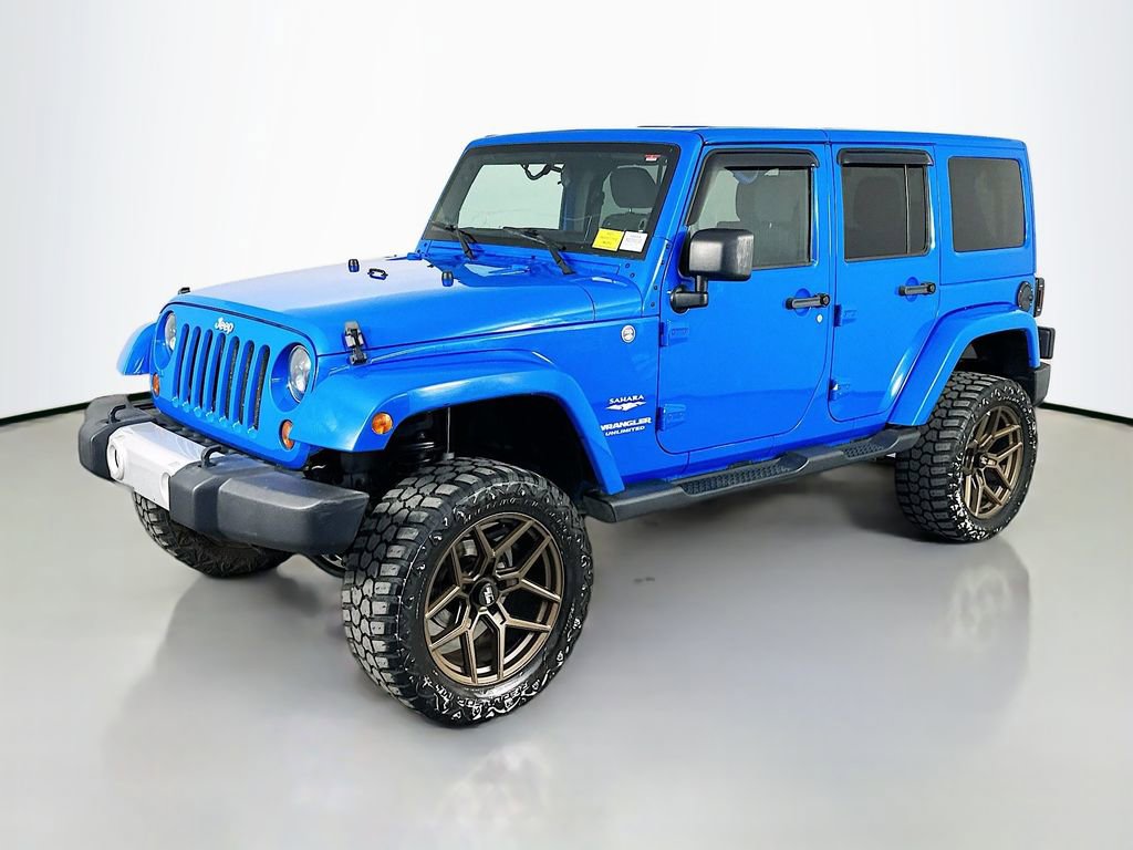Used 2011 Jeep Wrangler Unlimited Sahara w/ Dual Top Group AWD/4WD image 3