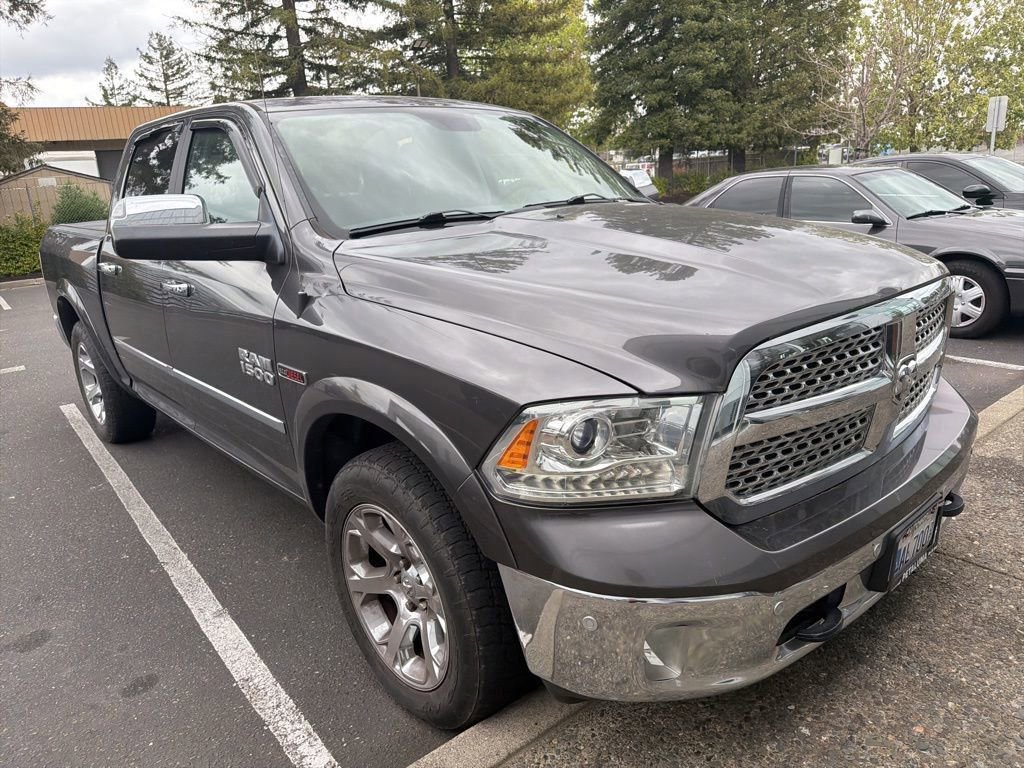Used 2017 RAM 1500 Laramie w/ Convenience Group AWD/4WD image 1