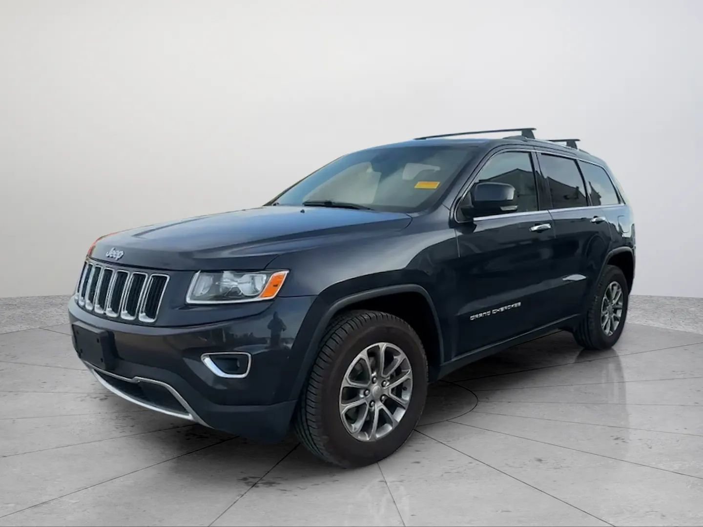 Used 2014 Jeep Grand Cherokee Limited AWD/4WD image 1