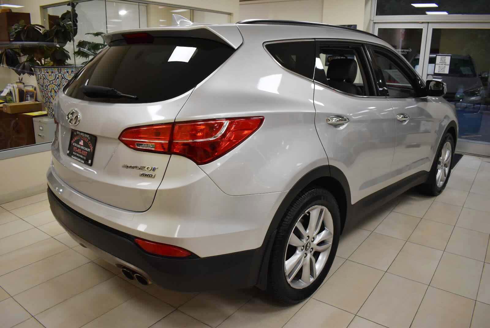 Used 2014 Hyundai Santa Fe Sport 2.0T w/ Navigation Package 06 AWD/4WD image 4