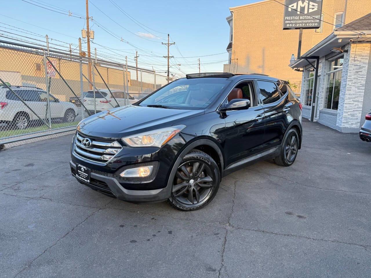 Used 2013 Hyundai Santa Fe Sport 2.0T w/ Technology Pkg AWD/4WD image 1