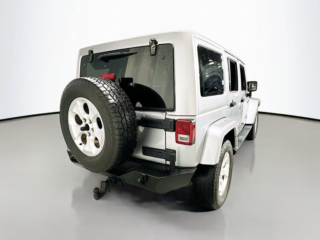 Used 2014 Jeep Wrangler Unlimited Sahara w/ Dual Top Group AWD/4WD image 8