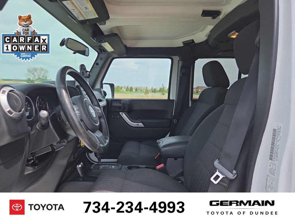 Used 2012 Jeep Wrangler Unlimited Sahara w/ Dual Top Group AWD/4WD image 13