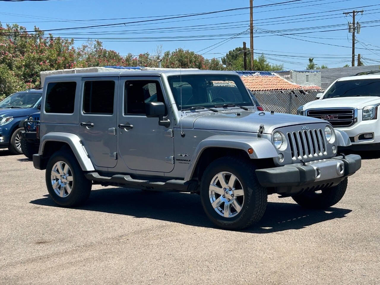 Used 2016 Jeep Wrangler Unlimited Sahara w/ Connectivity Group AWD/4WD image 1